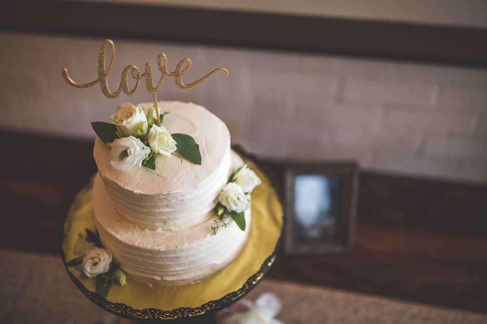 white cake , calligraphy cake topper, cake flowers
