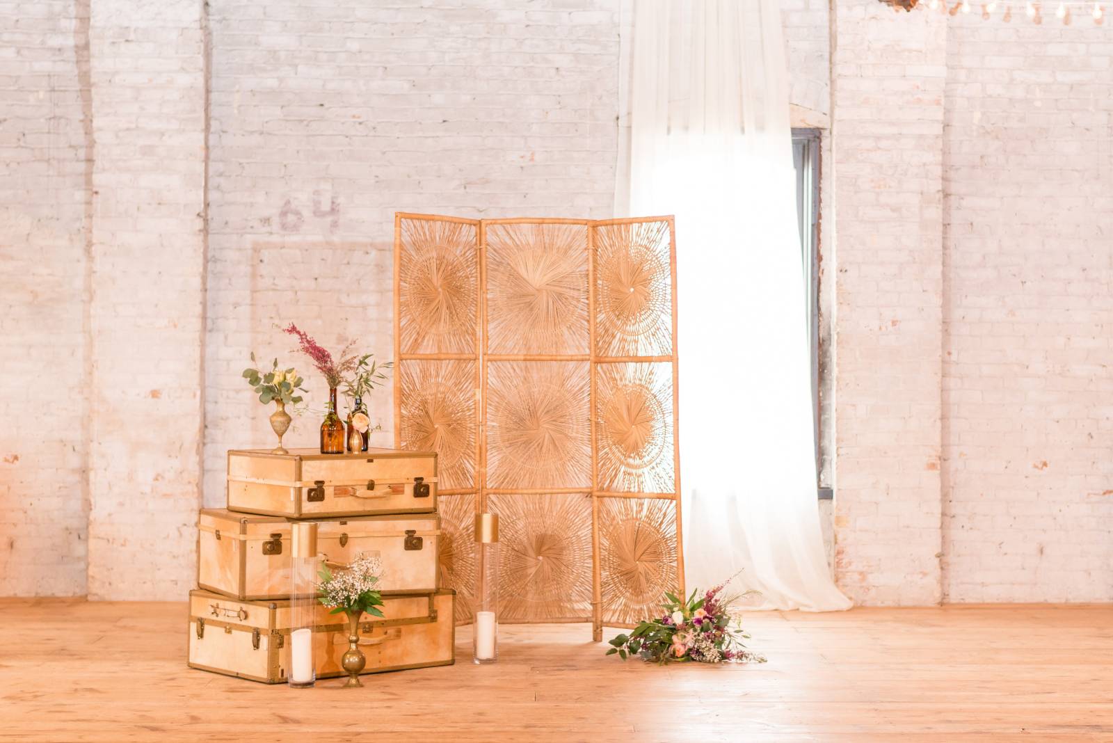 vintage boho wedding photo booth decor suitcases