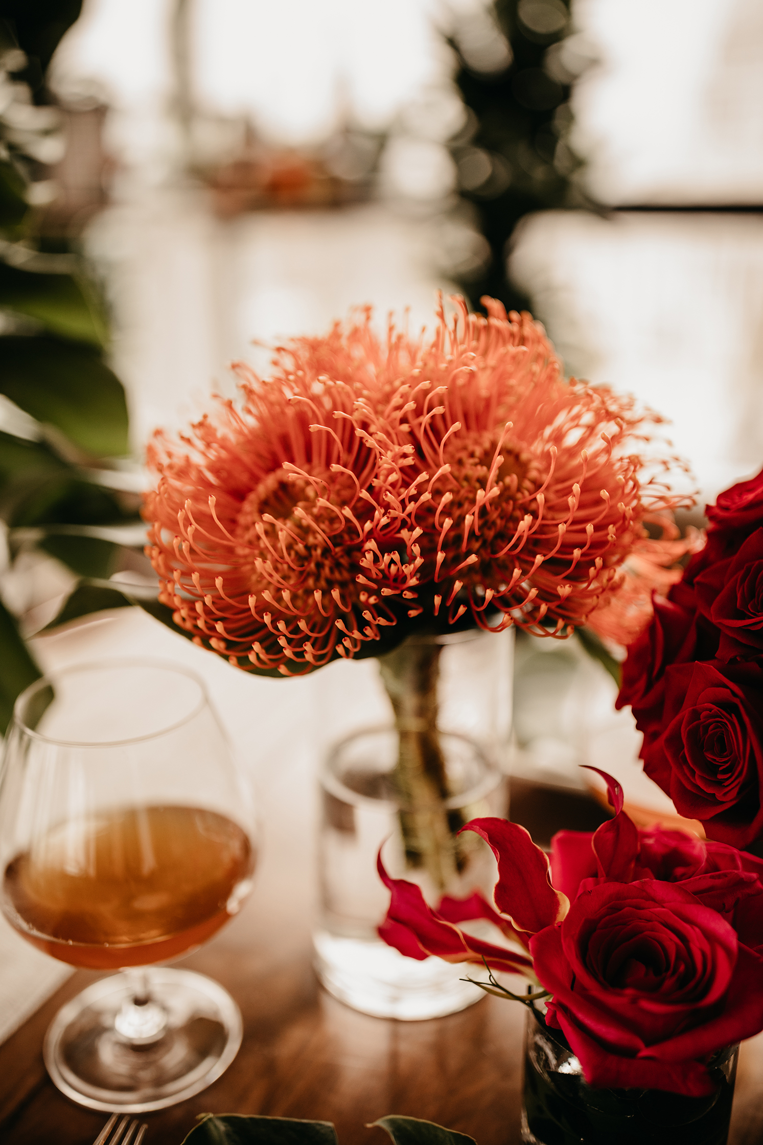 coral orange protea centerpiece