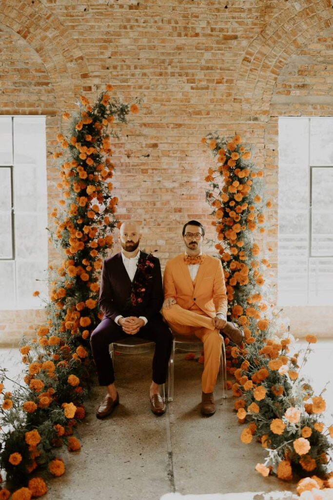 A WES ANDERSON-INSPIRED MARIGOLD + PURPLE COLOR-BLOCKED WEDDING DESIGN WITH '70S VIBES AT GARVER EVENTS IN MADISON, WISCONSIN