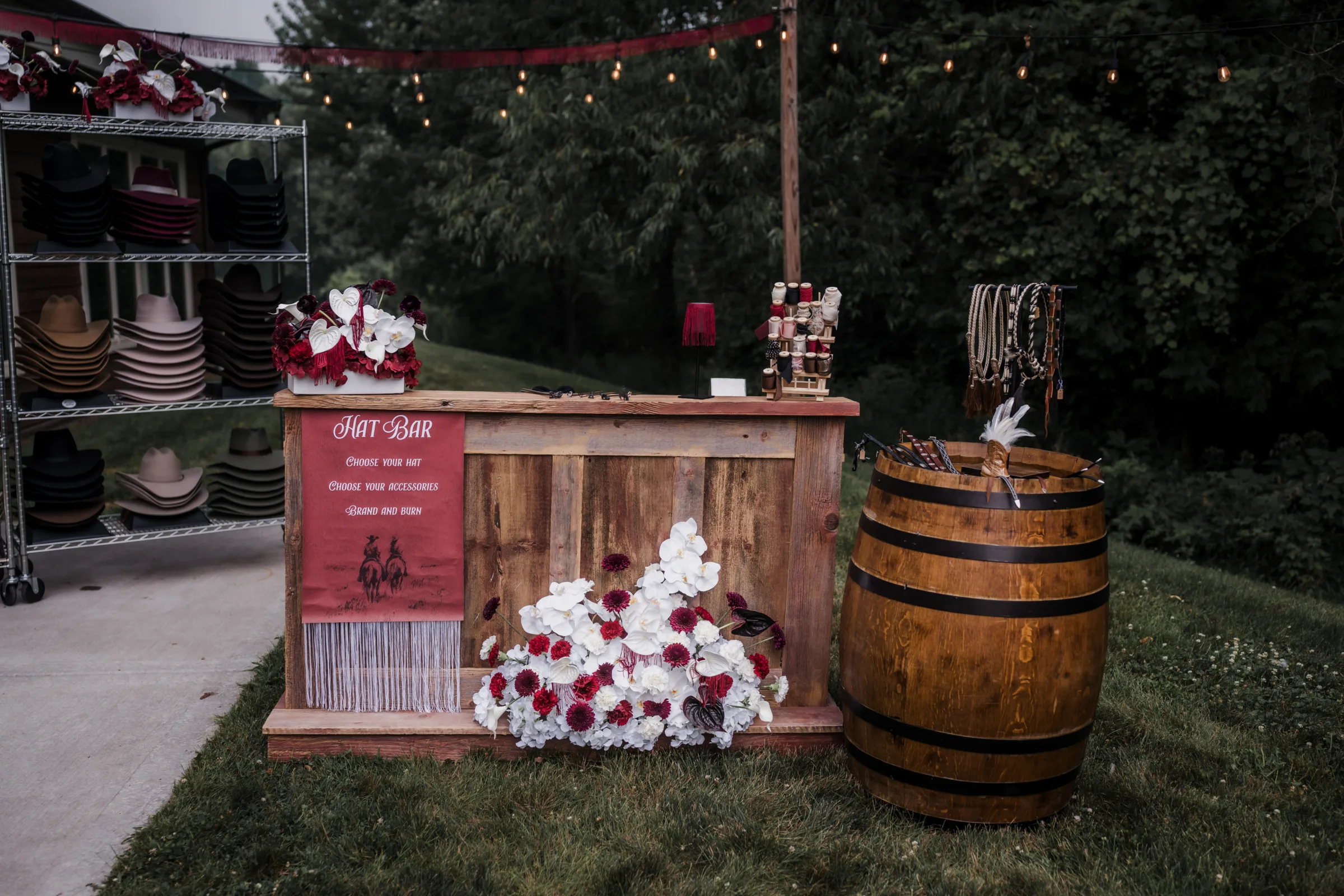 signage and custom hat bar accessories for wedding guests to purchase and customize in a modern cowboy wedding inspiration at Barnwood Events in Madison, Wisconsin