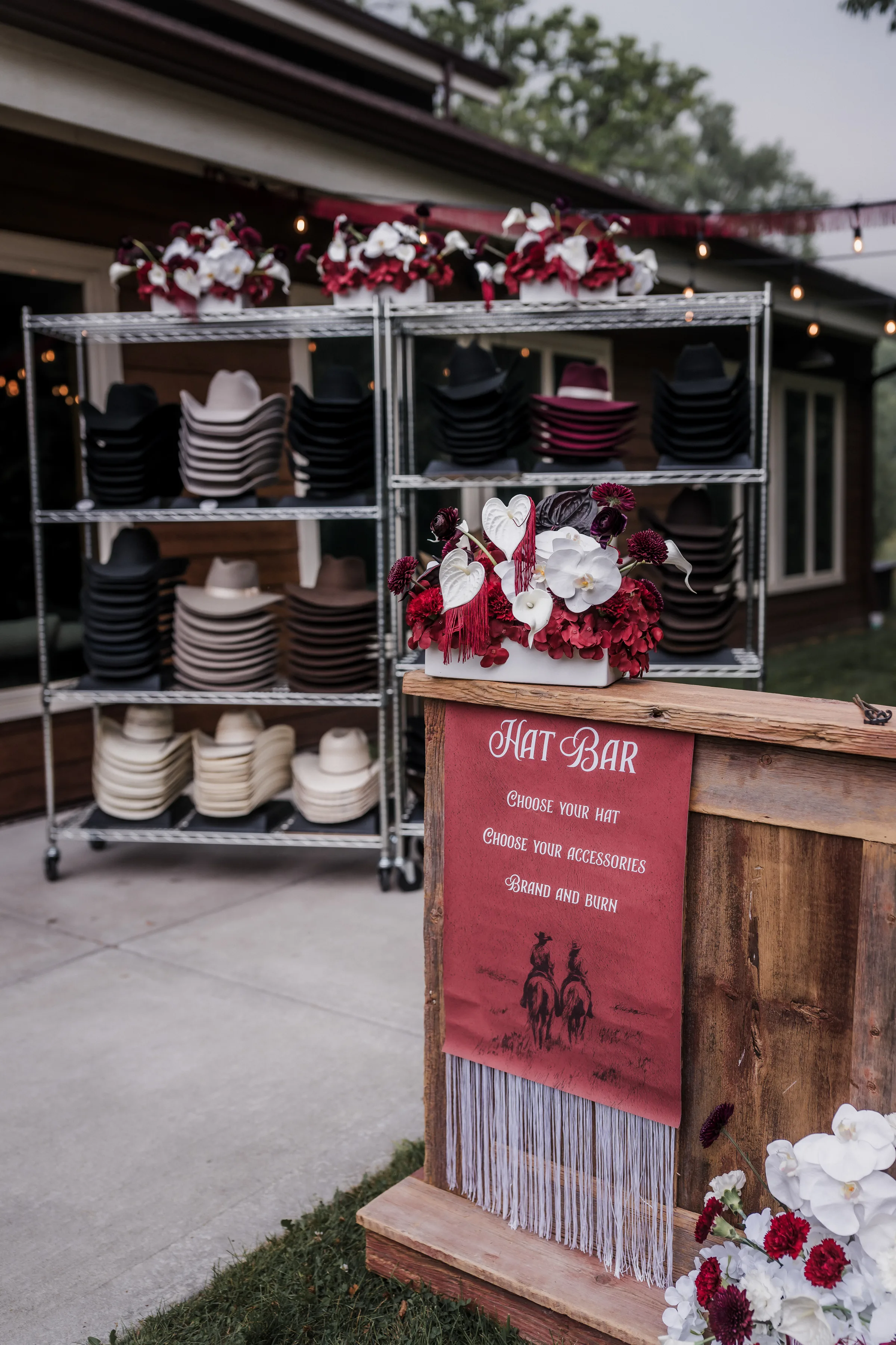 hat bar signage from LK Bridal Studio leading wedding guests to hat bar offerings from Hangman Hats