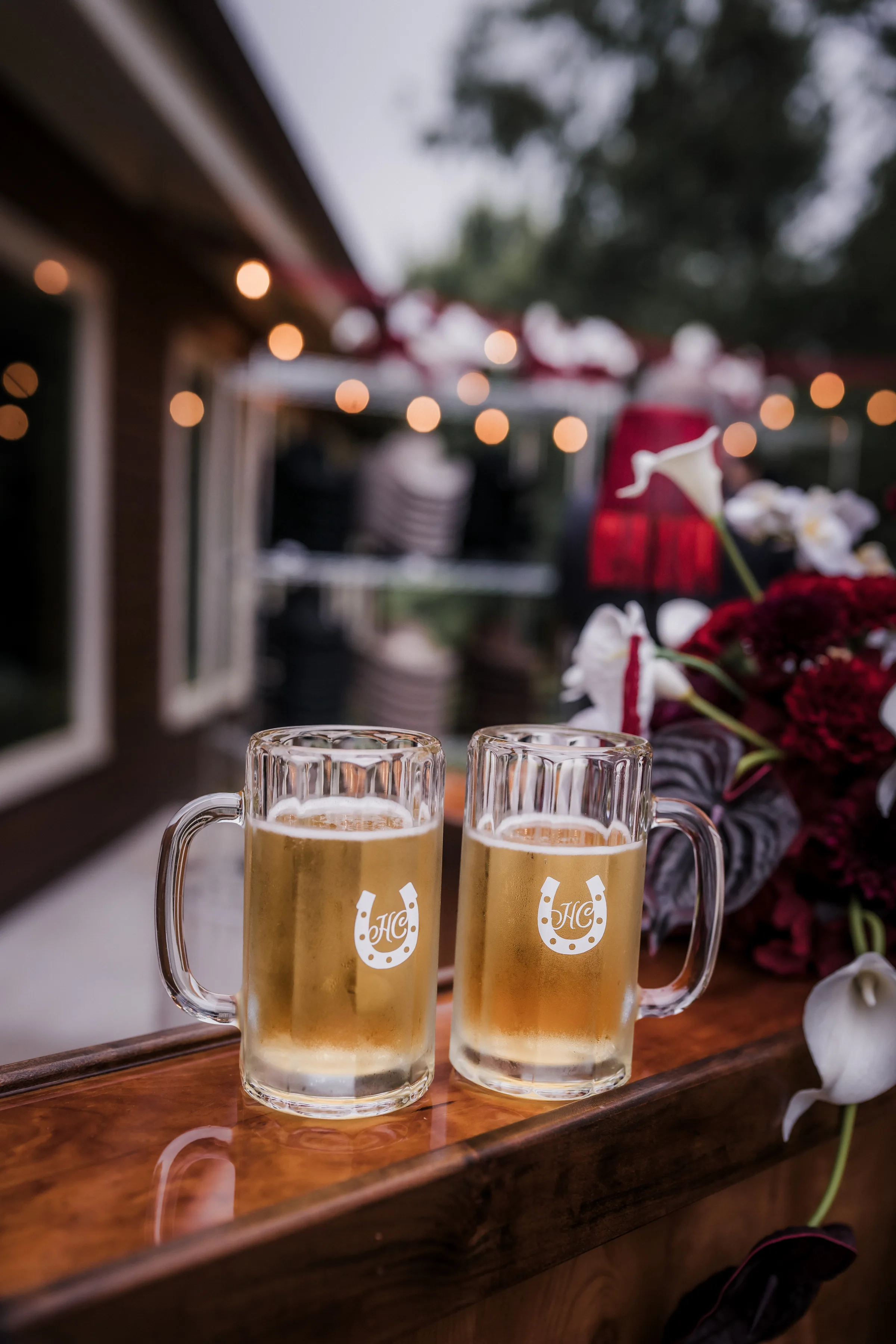 two beer steins sit side by side on the outdoor bar at Barnwood Events in Madison, Wisconsin
