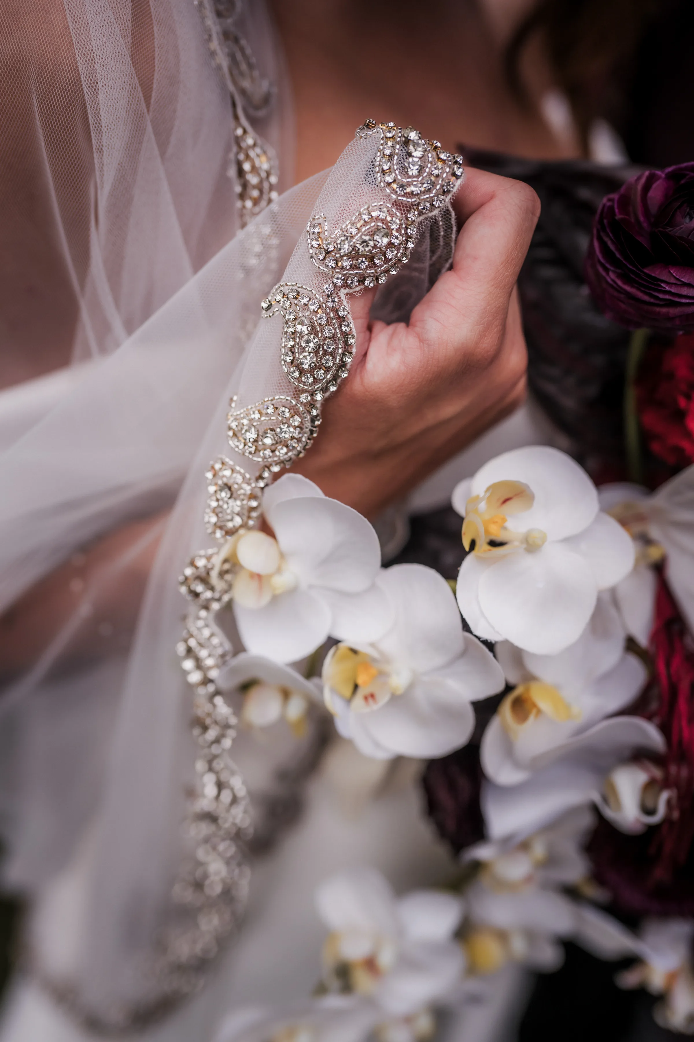 a detail photo of a crystal edge bridal veil