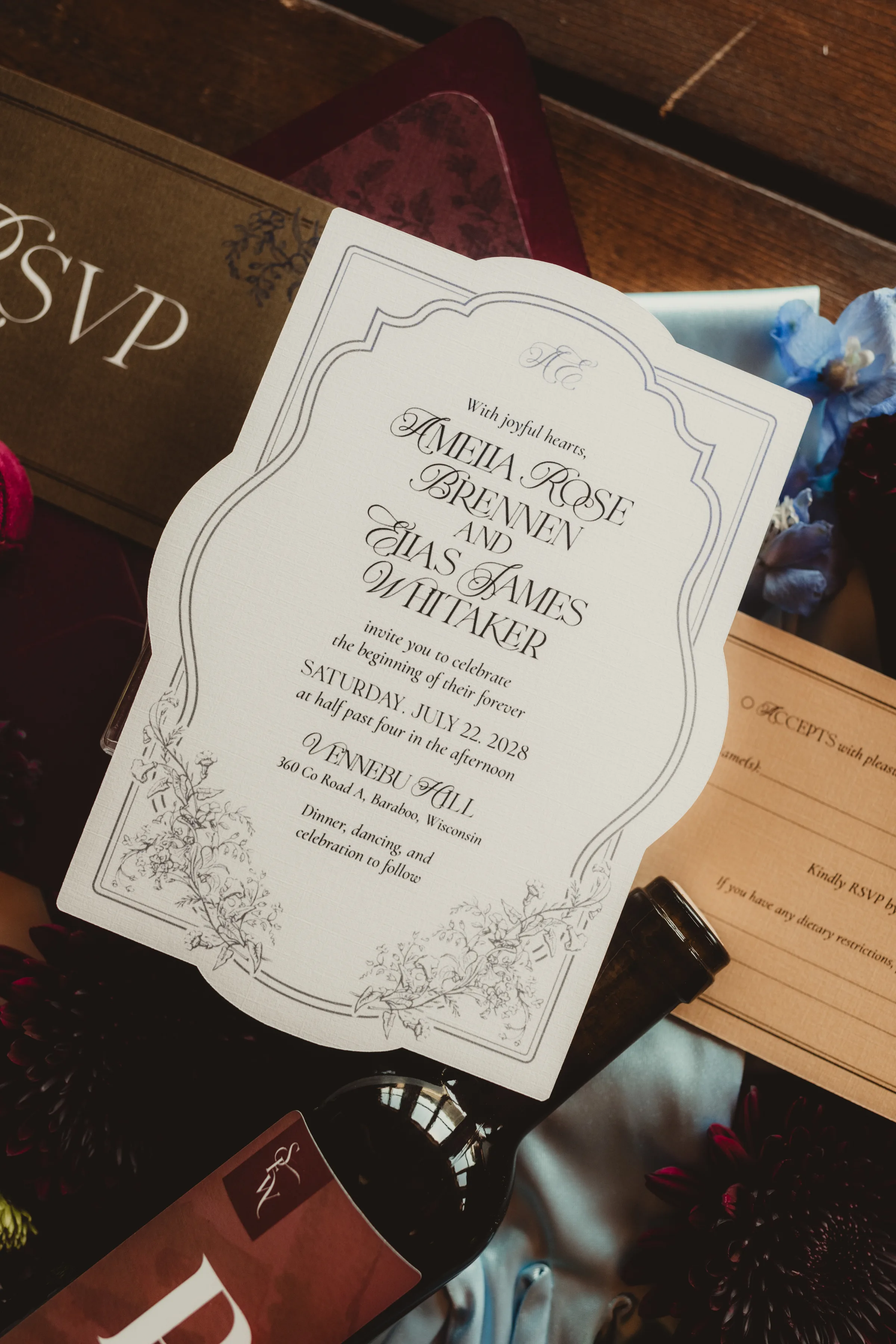 a close-up shot of a contour-cut wedding invitation by LK Bridal Studio