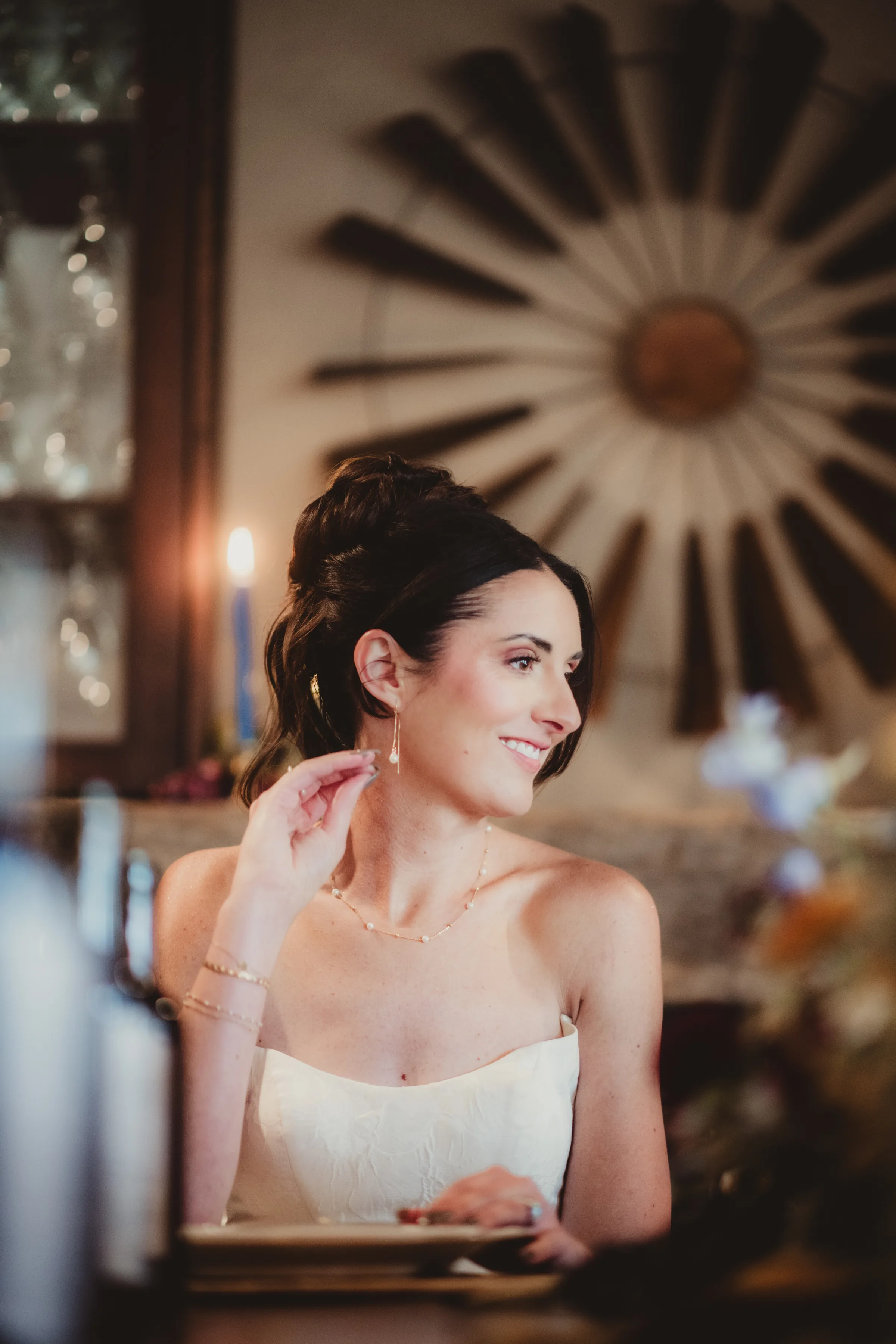 the bride model smiles and looks off to the side