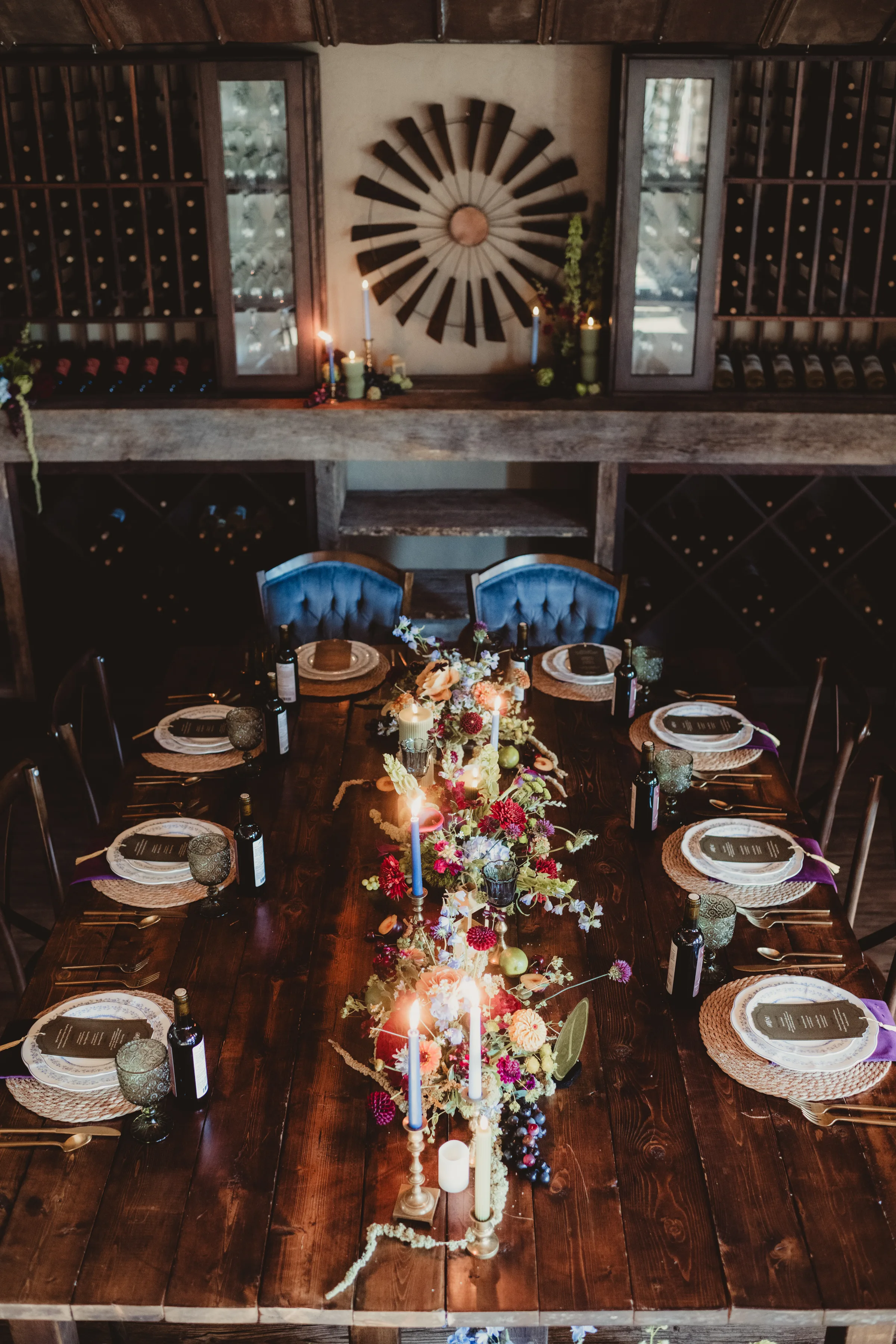 spiced garden party tablescape inspiration showing table settings and a floral centerpiece